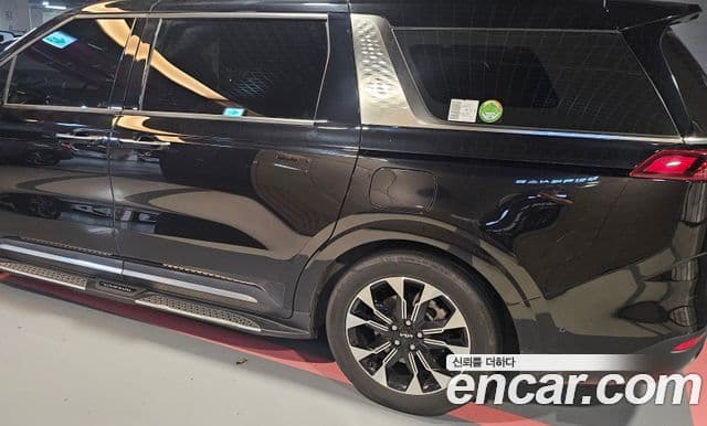 Kia Carnival 2023 — ფოტო 1/14