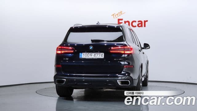 BMW X5 2023 — ფოტო 4/20