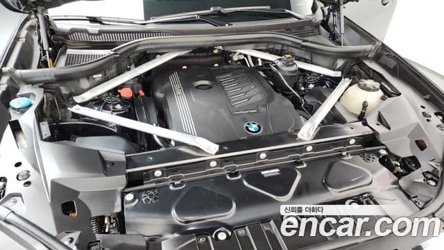 BMW X5 2023 — ფოტო 6/20