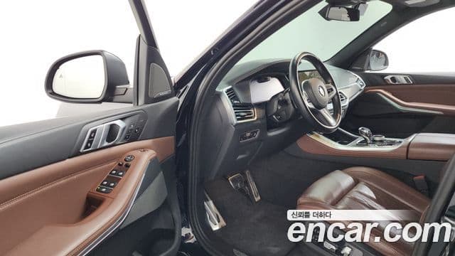 BMW X5 2023 — ფოტო 10/20
