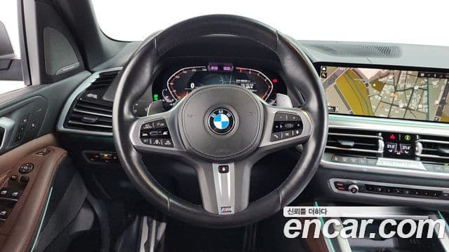 BMW X5 2023 — ფოტო 13/20