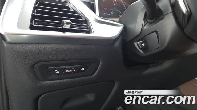 BMW X5 2025 — ფოტო 13/20
