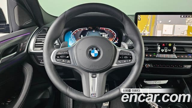 BMW X4 2025 — ფოტო 14/20
