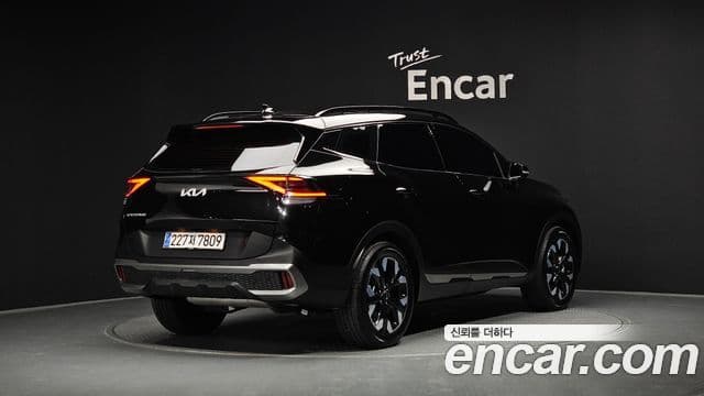 Kia Sportage 2023 — ფოტო 2/20