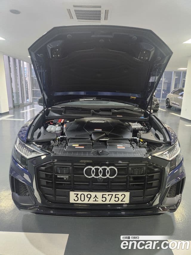 Audi Q7 2023 — Фото 6/20