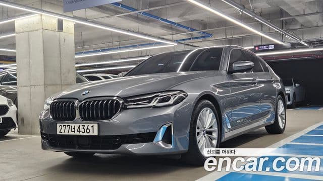 BMW 5 Series 2023 — ფოტო 20/20