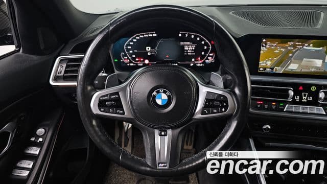 BMW 3 Series 2021 — ფოტო 16/20