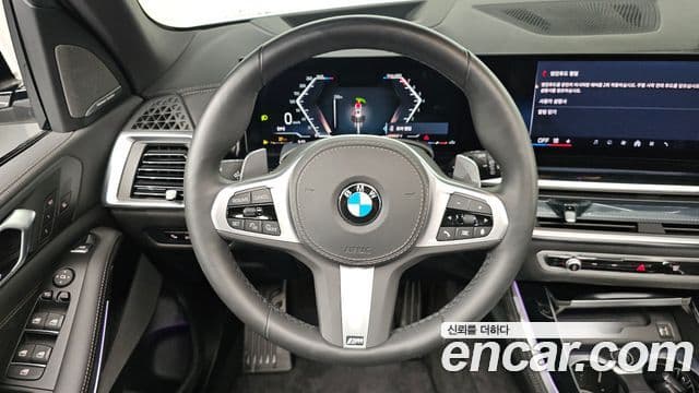 BMW X5 2025 — ფოტო 13/20