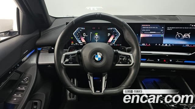 BMW 5 Series 2024 — ფოტო 14/20