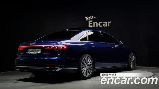 Audi A8 2021 — Фото 2/20