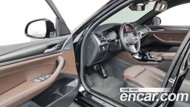 BMW X4 2023 — Фото 10/20