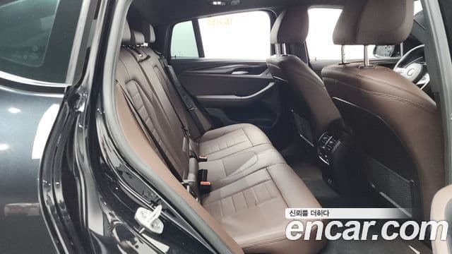 BMW X4 2023 — Фото 11/20