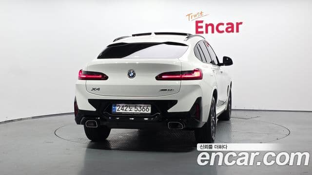 BMW X4 2023 — ფოტო 4/20