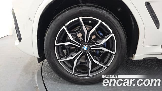 BMW X4 2023 — ფოტო 5/20