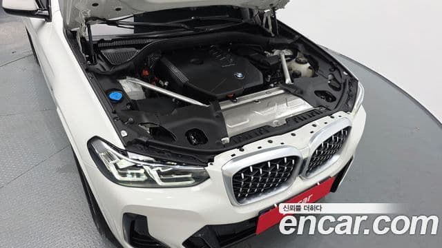 BMW X4 2023 — ფოტო 6/20