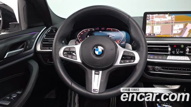BMW X4 2023 — ფოტო 13/20