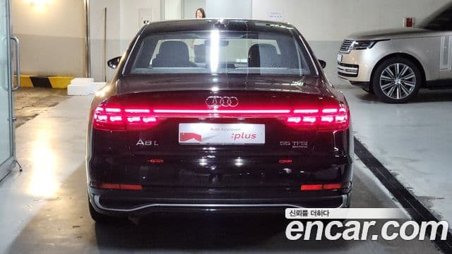 Audi A8 2023 — Фото 3/20