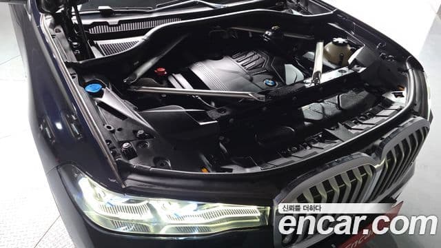 BMW X7 2022 — ფოტო 6/20