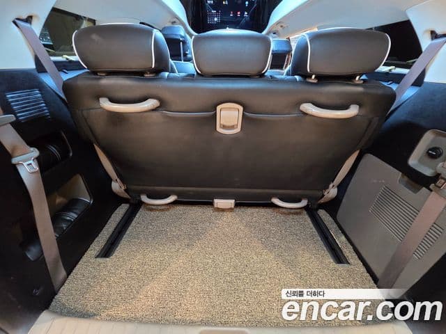 Kia Carnival 2021 — ფოტო 19/20