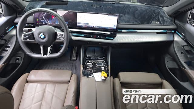 BMW 5 Series 2023 — ფოტო 7/20
