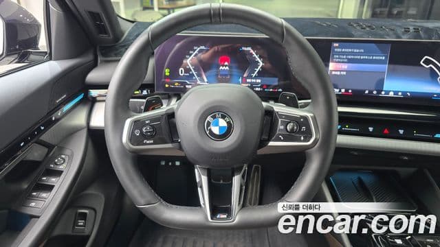 BMW 5 Series 2023 — фото 13 из 20
