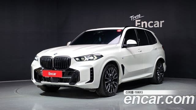 BMW X5 2023 — Фото 1/20
