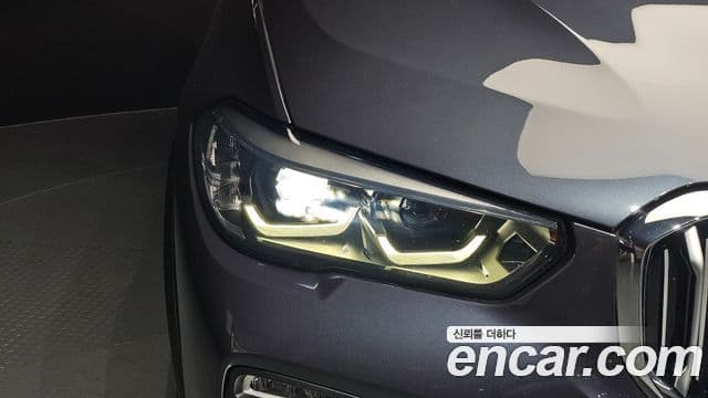 BMW X5 2019 — ფოტო 8/39