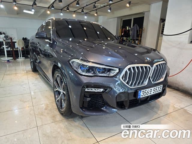 BMW X6 2020 — Фото 1/20