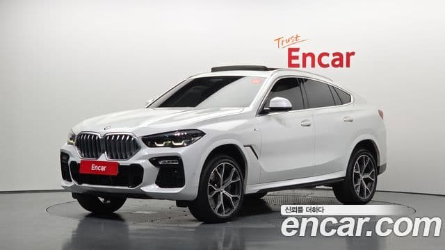 BMW X6 2021 — Фото 1/20