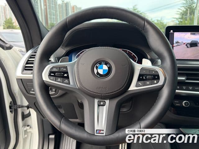 BMW X4 2024 — Фото 11/20