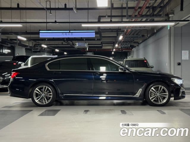 BMW 7 Series 2018 — ფოტო 19/20