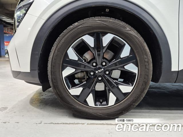 Kia Sportage 2022 — ფოტო 19/20