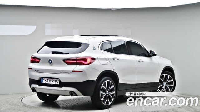 BMW X2 2021 — ფოტო 1/20