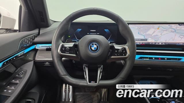 BMW i5 2024 — ფოტო 23/36