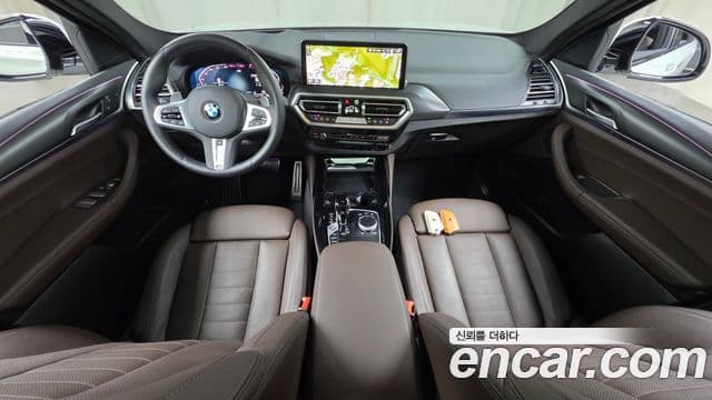 BMW X4 2024 — Photo 6/34