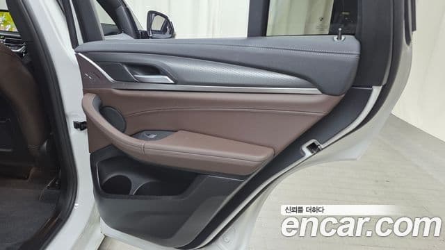 BMW X4 2024 — Photo 7/34