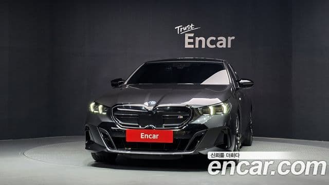 BMW i5 2023 — ფოტო 17/20
