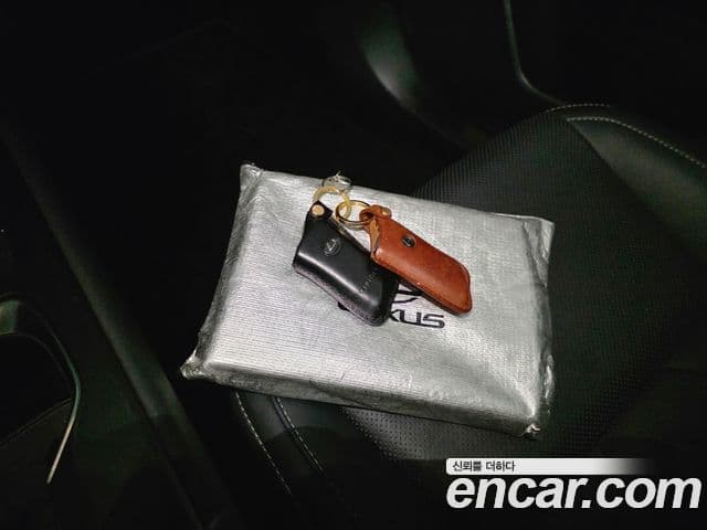 Lexus NX350h 2024 — Photo 2/40