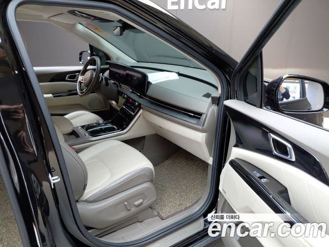Kia Carnival 2022 — ფოტო 26/31