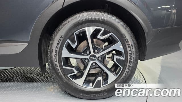 Kia Sportage 2023 — Photo 1/32