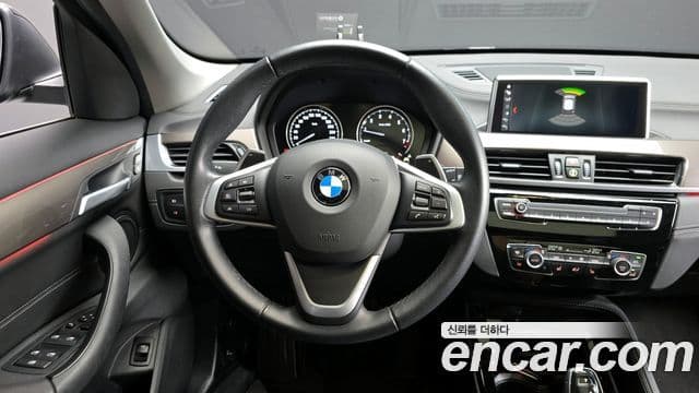 BMW X1 2021 — ფოტო 18/20