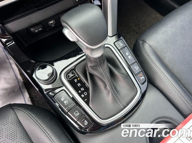 Kia Seltos 2021 — ფოტო 16/20