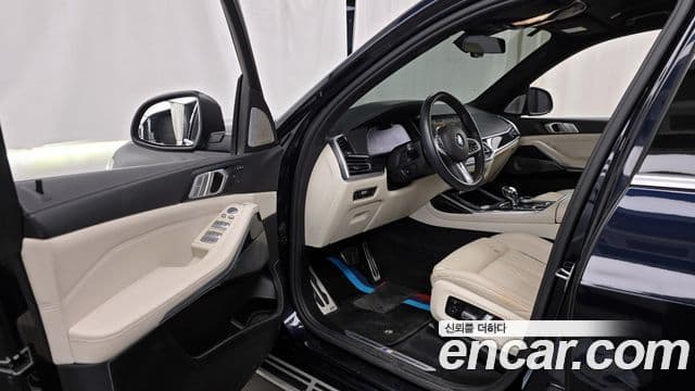 BMW X7 2021 — ფოტო 10/20