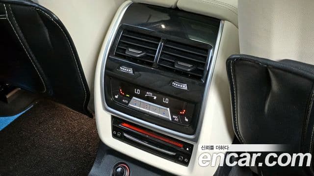 BMW X7 2021 — ფოტო 18/20
