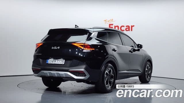 Kia Sportage 2021 — ფოტო 2/20