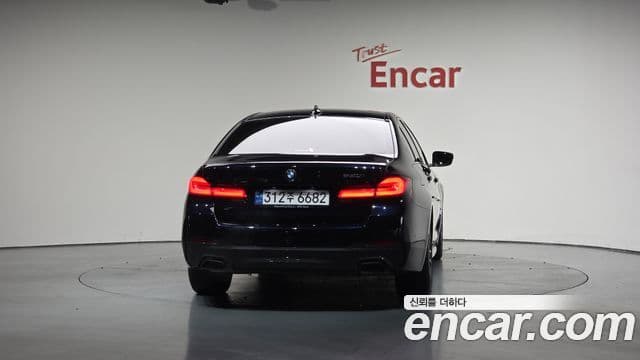 BMW 5 Series 2023 — ფოტო 4/20