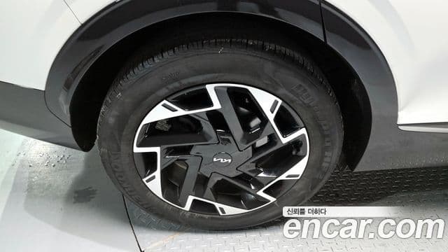 Kia Sportage 2021 — ფოტო 5/20