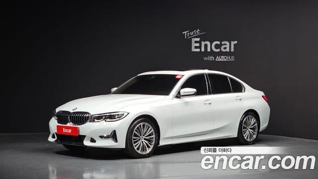 BMW 3 Series 2022 — ფოტო 1/20
