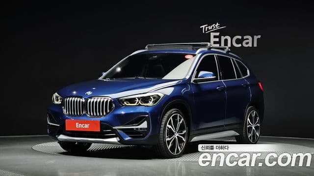 BMW X1 2021 — ფოტო 1/20