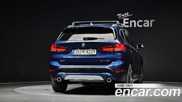 BMW X1 2021 — ფოტო 4/20